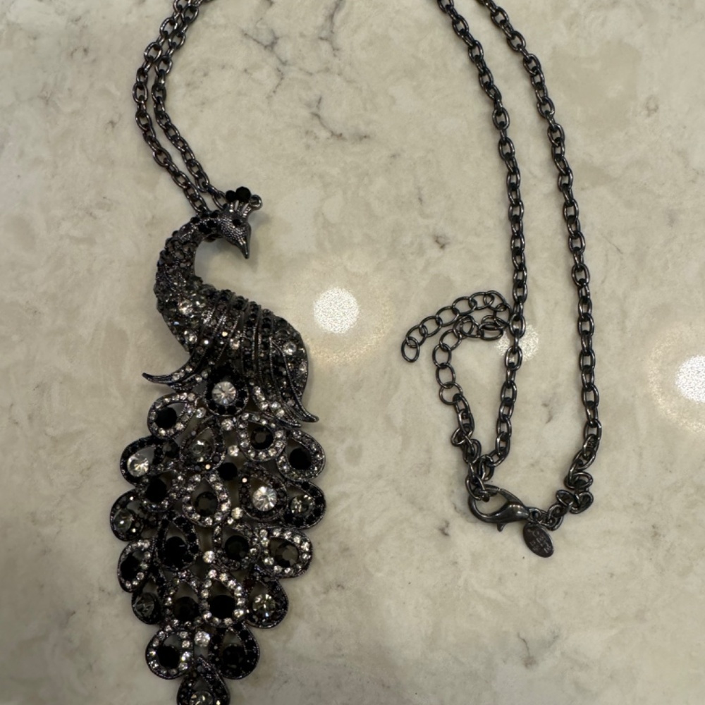 LN Cara large crystal peacock in gunmetal setting on 28" chain